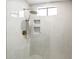 Modern shower with rainfall showerhead, handheld sprayer, and built-in shelving at 2949 N 29Th St, Phoenix, AZ 85016
