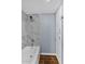 Bathroom with tiled shower and built-in storage cabinets at 2954 N Oregon St # 6, Chandler, AZ 85225