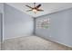 Spacious bedroom features a ceiling fan and bright window at 2954 N Oregon St # 6, Chandler, AZ 85225