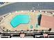 An inviting pool area featuring a sparkling pool, a hot tub, and ample outdoor seating at 2954 N Oregon St # 6, Chandler, AZ 85225