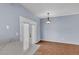 Dining area with access to back patio and modern light fixture at 2954 N Oregon St # 6, Chandler, AZ 85225