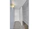 Hallway featuring a closet with shelving for extra storage at 2954 N Oregon St # 6, Chandler, AZ 85225