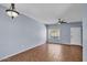 Living room with a ceiling fan, and an entry door at 2954 N Oregon St # 6, Chandler, AZ 85225