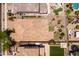 An aerial view showcases a desert landscaped backyard, including manicured plants and an outdoor seating area at 3022 E Santa Fe Ln, Gilbert, AZ 85297
