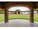 Framed view of the open-air community center overlooking the park, offering a relaxing and scenic gathering spot at 3022 E Santa Fe Ln, Gilbert, AZ 85297