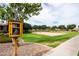 Scenic community park featuring a volleyball court and a charming little free library in a Gathering-friendly neighborhood at 3022 E Santa Fe Ln, Gilbert, AZ 85297