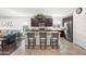 Bright kitchen features a large island with seating, modern appliances, and stylish pendant lighting at 3022 E Santa Fe Ln, Gilbert, AZ 85297