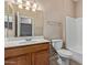 A well-lit bathroom features a vanity, toilet, shower, and a large mirror at 3434 E Baseline Rd # 126, Phoenix, AZ 85042