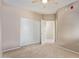 This light and airy bedroom features carpet floors, a ceiling fan, and a large closet at 3434 E Baseline Rd # 126, Phoenix, AZ 85042