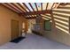 Exterior view of condo mailboxes, window with blinds, and overhead beams at 3434 E Baseline Rd # 126, Phoenix, AZ 85042