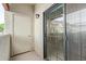 View of an outdoor patio featuring a sliding glass door, outdoor light fixture, and a door to storage at 3434 E Baseline Rd # 126, Phoenix, AZ 85042
