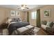 Cozy bedroom with soft lighting, plush bedding, and a serene, relaxing ambiance at 3537 W Shangri La Rd, Phoenix, AZ 85029