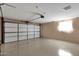 Spacious two-car garage with ample room for vehicles and storage at 3537 W Shangri La Rd, Phoenix, AZ 85029