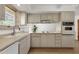 Bright kitchen featuring classic white appliances, sink and counter space at 3537 W Shangri La Rd, Phoenix, AZ 85029