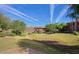 Community green space featuring trees, grassy lawn, and a ramada at 3935 E Rough Rider Rd # 1101, Phoenix, AZ 85050