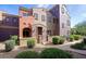Exterior of a luxury townhome with landscaped yard and private entry at 3935 E Rough Rider Rd # 1101, Phoenix, AZ 85050