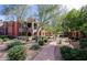 Exterior view of luxury townhomes with landscaped yards and walkway at 3935 E Rough Rider Rd # 1101, Phoenix, AZ 85050