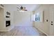 Cozy living room with fireplace and shuttered windows at 3935 E Rough Rider Rd # 1101, Phoenix, AZ 85050