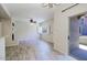 Open concept living area with fireplace and sliding glass doors to balcony at 3935 E Rough Rider Rd # 1101, Phoenix, AZ 85050