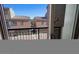 View from the balcony showcasing neighboring townhomes with red tile roofs at 3935 E Rough Rider Rd # 1101, Phoenix, AZ 85050