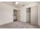 Spacious bedroom featuring neutral carpet, baseboards, and closet at 3940 E Heather Ct, Gilbert, AZ 85234