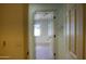 Hallway with a view into the bedroom with plush carpet at 3940 E Heather Ct, Gilbert, AZ 85234