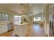 Open kitchen overlooking the living room, featuring stainless steel appliances and an island at 3940 E Heather Ct, Gilbert, AZ 85234