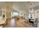 Spacious living area with ample natural light, modern furnishings, and hardwood floors at 3940 E Heather Ct, Gilbert, AZ 85234