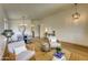 Inviting living space with stylish furniture, a jute rug, and contemporary lighting fixtures at 3940 E Heather Ct, Gilbert, AZ 85234