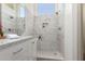 Luxurious main bathroom featuring marble countertops, a walk-in shower, and modern fixtures at 3940 E Heather Ct, Gilbert, AZ 85234