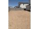 Unfinished backyard with privacy wall, perfect for creating an outdoor oasis at 4924 W Brown St, Glendale, AZ 85302