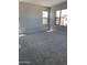 Spacious bedroom featuring plush carpeting, neutral walls, and plenty of natural light at 4924 W Brown St, Glendale, AZ 85302