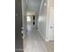Inviting entryway showcasing wood-look tile flooring, and a staircase leading to the upper level at 4924 W Brown St, Glendale, AZ 85302