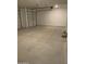Large garage with two doors, open space, and bright lighting at 4924 W Brown St, Glendale, AZ 85302