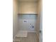 Functional laundry room with ample space and necessary hookups for appliances at 4924 W Brown St, Glendale, AZ 85302