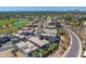 Aerial view of golf course community with luxury homes and mountain views at 4938 N Ascent Dr, Scottsdale, AZ 85251
