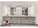 Modern bathroom featuring double sinks, sleek cabinets, and stylish vertical lighting for a contemporary feel at 4938 N Ascent Dr, Scottsdale, AZ 85251
