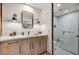 Stylish bathroom with a glass-enclosed shower, modern vanity, and decorative lighting for a spa-like experience at 4938 N Ascent Dr, Scottsdale, AZ 85251