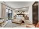 Inviting bedroom with a comfortable bed, neutral decor, and a sliding glass door to a private patio at 4938 N Ascent Dr, Scottsdale, AZ 85251