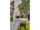 Beautiful home entrance with desert landscaping, a modern walkway, and an artistic design at 4938 N Ascent Dr, Scottsdale, AZ 85251