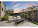 Outdoor seating area with a modern firepit, perfect for entertaining and enjoying evenings outdoors at 4938 N Ascent Dr, Scottsdale, AZ 85251