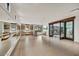 Fitness studio with mirrors, ballet bar, storage, and doorway to gym at 4938 N Ascent Dr, Scottsdale, AZ 85251