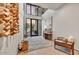 Bright foyer with an artistic wall, modern decor, and tall ceilings near the entry door at 4938 N Ascent Dr, Scottsdale, AZ 85251