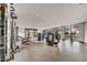 Bright gym features floor-to-ceiling windows and varied workout equipment at 4938 N Ascent Dr, Scottsdale, AZ 85251