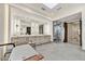 Luxurious bathroom with a soaking tub, dual vanities, and a glass-enclosed shower at 4938 N Ascent Dr, Scottsdale, AZ 85251