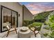 Cozy patio with modern furniture, green plants, and a serene atmosphere for outdoor relaxation at 4938 N Ascent Dr, Scottsdale, AZ 85251