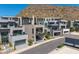 Modern townhome exteriors offer sleek designs and private balconies, complemented by well-maintained landscaping at 4938 N Ascent Dr, Scottsdale, AZ 85251