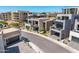 Beautiful street view of modern homes with balconies and attached garages at 4938 N Ascent Dr, Scottsdale, AZ 85251