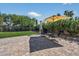 Well-maintained backyard featuring lush lawn, patio with lounge chairs, and mature landscaping at 5101 E Paradise Dr, Scottsdale, AZ 85254