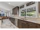Beautiful kitchen with stainless steel appliances, custom cabinets, granite countertops and plenty of room to entertain at 5101 E Paradise Dr, Scottsdale, AZ 85254